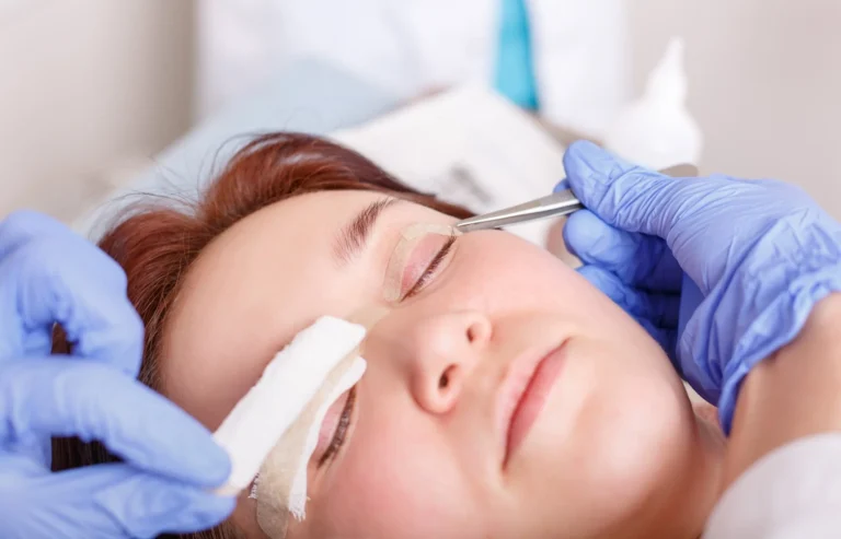 how to get insurance to pay for eyelid surgery